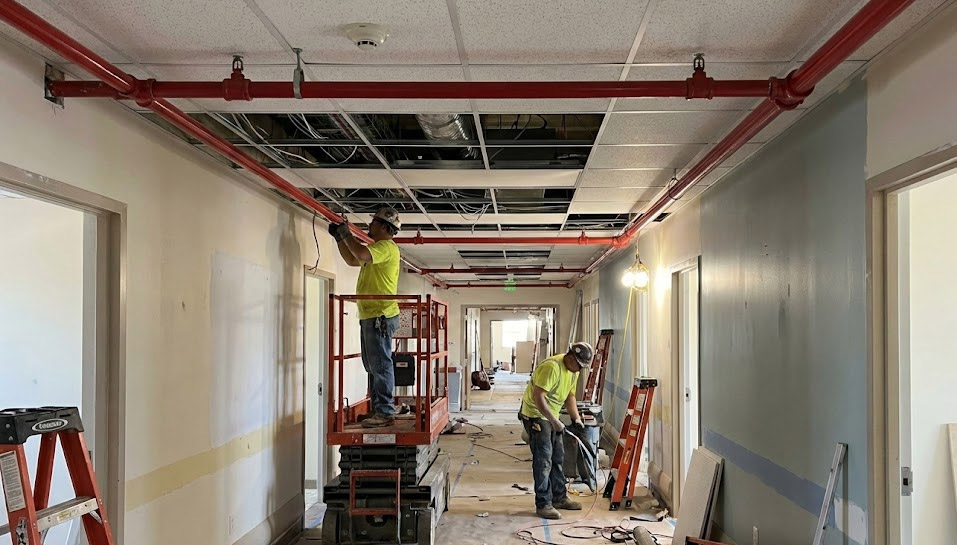 Automatic fire sprinkler piping and installation in a hospital corridor